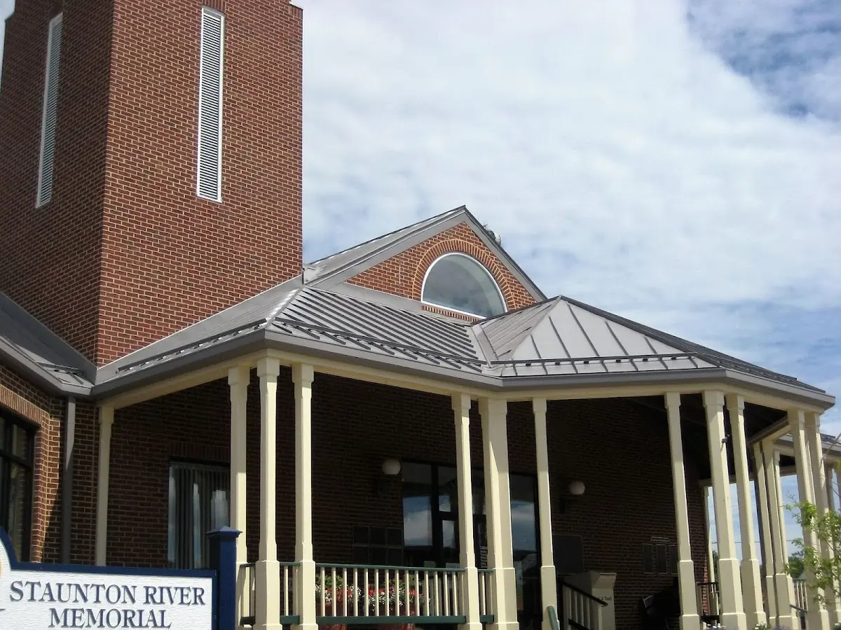 Skilled roofing craftsmen working on a residential roof in Douglassville